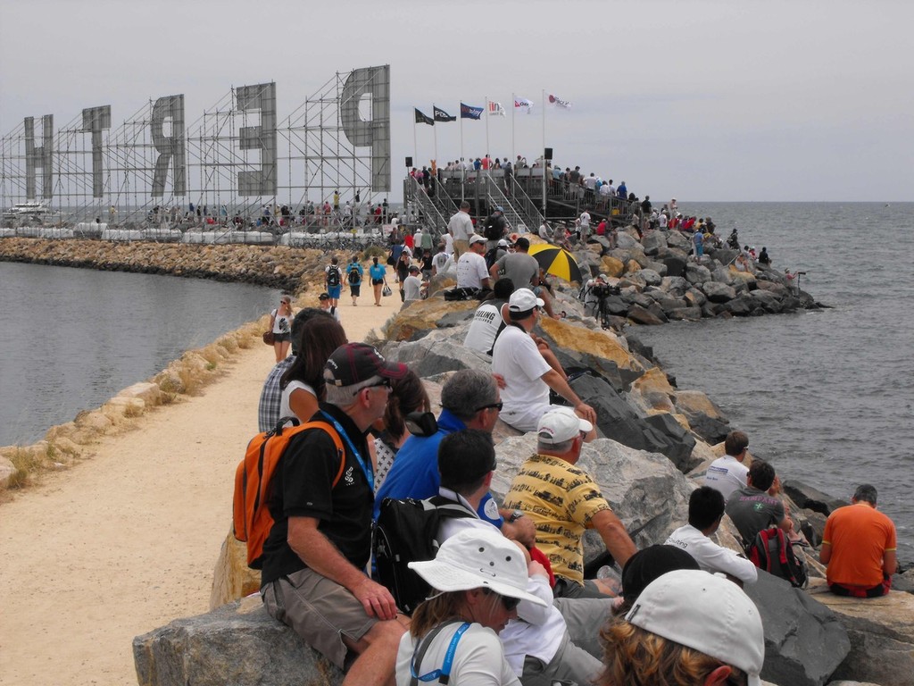 Perth 2011 - ISAF Sailing World Championships crowds on rock wall and spectator grandstand  © John Curtis